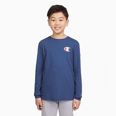 Every boy needs a long-sleeve graphic tee in his wardrobe. This one features a logo sleeve detail so he can showcase his Champion pride. This tee will seamlessly take him from school to practice.Closure Type: Pullover HeadFit: Classic FitNeckline: Crew NeckSleeve Length: Long SleeveFiber Content: 60% Cotton, 40% PolyesterFabric Description: JerseyCare: Machine Wash, Tumble DryCountry of Origin: Imported Sleeve Detail, Big Boys, Kids Boys, Long Sleeve T Shirt, Shirts Tops, Kids Tshirts, Graphic Tee, Long Sleeve Tshirt, Graphic Tees