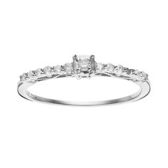 a white gold engagement ring with princess cut diamonds