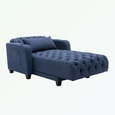 a blue chaise lounge chair with pillows on it's back and arms, viewed from the side