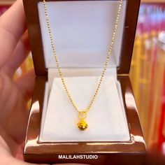 *Bell is gold. Necklace is gold plated.* Bell pendant: 99.99% gold, weight 0.15-0.17 grams, real gold  *Little Jingling sound when shake* Necklace: 925 silver 23K gold plated (vermeil), weight 0.4 grams. Length 44 cm. (circumference) Gold has been guaranteed to meet standards from the Gold Traders Association. Crafted, made in Thailand You will receive :  gold case, gift bag, wishes card Note to buyer: >The picture is enlarged. Please check the size and consider from the vdo clip and illustrations. >The necklace is delicate necklace. You may use it with special care. >The price do not cover any applicable tax or duty that might be charged by customs  >Buyers are responsible for any charges. >In case the parcel is lost or damaged during transportation, the seller is not responsible in any c Yellow 22k Gold Necklaces For Anniversary, Gold 22k Round Pendant Necklace, Gold Necklace With 22k Round Pendant, Yellow Gold Plated Necklaces For Anniversary, 22k Yellow Gold Necklace As A Gift, Yellow 22k Gold Necklace With Round Pendant, 22k Gold Yellow Necklace With Round Pendant, Gold Trader, Necklace For Her