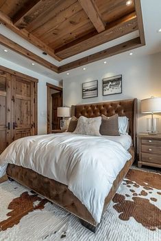 a large bed sitting in the middle of a bedroom next to a wooden door and window