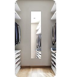 an empty walk in closet with clothes on shelves