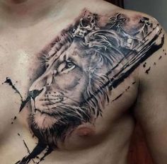 a man's chest with a lion and crown tattoo on his chest, in black ink