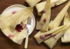 corn on the cob with cranberry sauce and fork