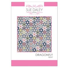 the sue dale dragonfly quilt pattern is shown in pink, blue and grey colors