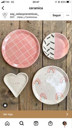 three plates with different designs on them and one has a heart shaped plate in the middle