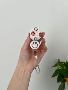 Boho Smiley Badge Reel Required to wear your badge to work? This retractable badge reel would be a unique way to personalize your work attire! Students, teacher, nurses, dentists and all others!  Velcro placed on back to be interchangeable but if you want permanent just let me know!  Just message me if you want a custom request, I look forward to hearing from you! Alligator clip or belt clip options 🌟Retracts 34"  🌟3/4 diameter velcro button  🌟Silicone beads 🌟interchangeable button topper Fun White Badge Reel For Personal Use, Customizable White Badge Reel, Handmade Adjustable White Badge Reel, Nurse Badges, Adjustable Black Retractable Badge Holder, Novelty Black Badge Reel Customizable, Multicolor Retractable Badge Reel, Nurse Badge Reel, Nurse Badge