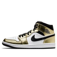 The Air Jordan 1 Mid SE ‘Metallic Gold’ is the perfect sneaker to add some luxury to your style. The white leather upper is contrasted by metallic gold overlays and black hits on the Swoosh and collar, creating a look that will turn heads. With Jumpman iconography woven into the tongue tag and classic Wings logo stamped on the lateral collar flap, this mid-top sneaker has all of the details covered. And don’t forget about the encapsulated Nike Air cushioning in the heel – it ensures a comfortable, luxurious ride. (AJ1/SNKR/Retro/Men's/High Top/Basketball) Classic Gold Sneakers For Streetwear, Luxury Leather High-top Basketball Shoes, Luxury Lace-up Basketball Shoes, Gold High-top Leather Basketball Shoes, Gold Basketball Shoes With Boost Midsole, Gold Basketball Shoes With Boost Midsole For Sports, Luxury High-top Sneakers With Round Toe For Sports, Luxury High-top Sports Sneakers, Luxury Basketball Shoes