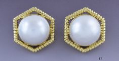 Presented is a lovely pair of 18 karat gold and pearl earrings. These are relatively modern earrings, likely made in Italy or elsewhere in Europe. The earrings are done in a hexagonal style, each set with a beautiful mabe pearl of about 18.5 millimeters in diameter. The gold settings are heavy and high quality, done in a ribbed design. The earrings have omega style clipbacks for wear with unpierced or pierced ears, but a jeweler could easily add posts so the earrings could be worn specifically f Elegant Octagon Earrings For Formal Occasions, Elegant Octagon Wedding Earrings, Elegant White Gold Octagon Earrings, Elegant Gold Hexagon Earrings, Elegant White Octagon Earrings, Elegant Hexagon Earrings For Gift, Elegant White Hexagon Jewelry, Gold Octagon Earrings For Wedding, Gold Octagon Wedding Earrings