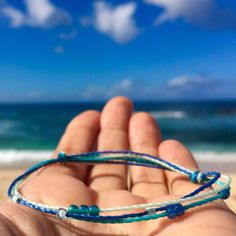 Ocean blues handmade waterproof bracelet. perfect for the ocean lovers and watermen/women 💙 the cord is 100% waterproof so leave on to swim and surf! PLEASE MESSAGE ME FOR LARGER QUANTITY OR DIFFERENT COLORS!  SEE ALL MY BRACELETS AND ANKLETS HERE: https://www.etsy.com/shop/LOphoto808?ref=l2-shopheader-name&section_id=19725982 please contact me here: https://www.etsy.com/conversations/new?with_id=30970463 if you need assistance with ordering or have any questions. PLEASE VISIT MY HOME PAGE HERE Bracelets Beachy, Beachy Jewelry, Bracelet Summer, Summer Anklets, Diy Jewlery, Badass Style, Lock Style, Summer Bracelets, Ocean Lover