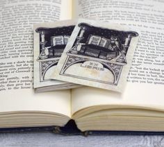 an open book with two pictures on it