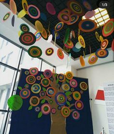 a tree made out of circles hanging from the ceiling