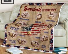 a baseball themed throw blanket on a couch