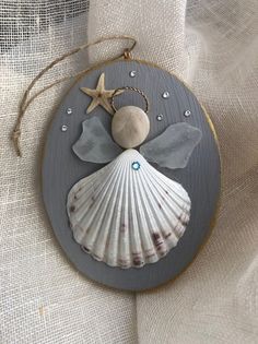 an ornament with a shell and starfish on it