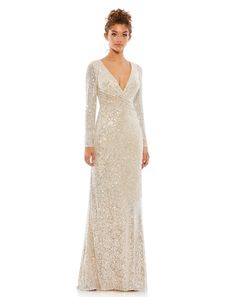 Ieena for Mac Duggal Sequined fabric (100% polyester) Fully lined through bodice and skirt; semi-sheer unlined sleeves V-neckline Long sleeves with concealed zipper at wrist Faux wrap bodice Concealed back zipper Approx. 62.5" from top of shoulder to bottom hem Available in Nude/Silver and Wine Style #26574 Long Sleeve Sequin Dress, Mac Duggal Dresses, Trumpet Gown, Unique Prom Dresses, Long Sleeve Gown, Designer Prom Dresses, Prom Designs, Column Gown, Long Sleeve Sequin