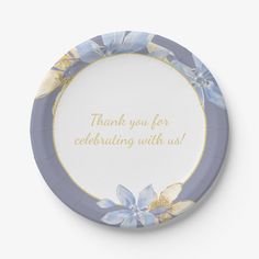 a blue and yellow flowered plate with the words thank you for celebrating with us