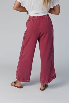 Comfy and cozy all in one! Our lounge pant features a wide leg, drawstring waist and pockets (yay!). It will be your closet fave to pair with graphic tees for lounging or on-the-go outfits! *Due to lighting and differences in monitors, actual colors may vary slightly from what appears online. Model is 5'8" and wearing size Small Approximate measurements are as follows: SMALL: Waist: 26", Inseam: 26 1/2", Length: 34" MEDIUM: Waist: 28", Inseam: 27", Length: 34 1/2" LARGE: Waist: 30", Inseam: 27 1 Soft-washed Wide Leg Bottoms For Fall, Fall Soft-washed Wide Leg Bottoms, Comfortable Pull-on Leisure Bottoms, Casual Wide Leg Soft-washed Bottoms, Relaxed Bottoms With Drawstring For Fall, Relaxed Drawstring Bottoms For Fall, Wide-leg Yoga Pants With Pockets For Loungewear, Full Length Cotton Pants With Drawstring, Cotton Drawstring Full-length Pants