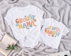 two t - shirts with the words groo mama and the name jesus on them