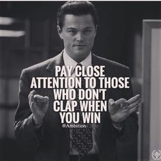 a man in a suit and tie holding his hands up with the words pay close attention to those who don't clap when you win