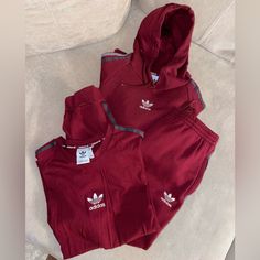 Men Adidas 3pc Jogging Suit. 3pcs Hoodie, Joggers & T-Shirt Included. Size: Xl Some Prices Are Firm And Some Are Negotiable. Inquire About Bundles For Cheaper Prices! Sporty Red Tracksuit For Winter, Sporty Red Winter Tracksuit, Red Cotton Sporty Tracksuit, Red Cotton Tracksuit For Winter, Casual Red Sets For Streetwear, Sporty Streetwear Sets For Winter, Sporty Winter Streetwear Sets, Red Cotton Athleisure Tracksuit, Fitted Red Winter Tracksuit