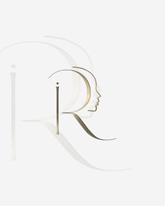 a woman's face with the letter r in gold and silver on a white background