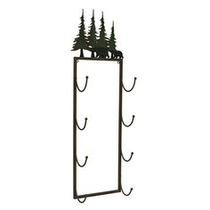 a metal rack with three trees and two bears on it's sides, hanging from the wall