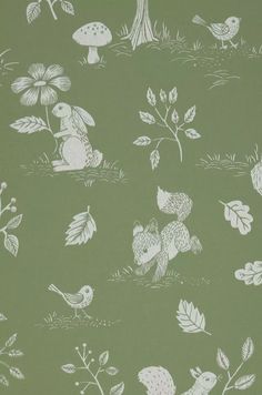 a green wallpaper with white birds and mushrooms