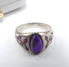 Vintage marked David Saigal Canada 925 & sterling silver enamel amethyst ring size 9, In good vintage condition. The ring 14 mm wide, Amethyst 12 mm x 6 mm. Weighs 6 gram. Thanks. Purple Hallmarked Signet Ring, Vintage Purple Amethyst Ring With Polished Finish, Vintage Amethyst Ring With Polished Finish, Vintage Purple Sterling Silver Ring, Silver Enamel Gemstone Ring For Anniversary, Vintage Silver Enamel Ring For Formal Occasions, Formal Silver Enamel Ring Hallmarked, Formal Silver Hallmarked Enamel Ring, Formal Purple Sterling Silver Ring