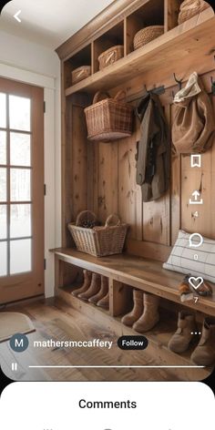 a wooden bench sitting in front of a window next to a coat rack with shoes on it