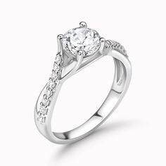 a white gold engagement ring with diamonds on the side