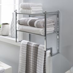 Add a stylish touch to your bathroom with the Organize It All 2 tier wall mounted shelves and towel bar. The perfect addition to create space and style. Sturdy wire shelves and a towel bar on the bottom. Use the shelves for décor or storing towels and bath products, maximizing the space in your bathroom. Designed with a chrome finish making this the perfect addition to any bathroom! Organize It All Metro Chrome 2-Tier Metal Wall Mount Bathroom Shelf (17.62-in X 18.25-in X 9.62-in) | NH-16988W Chrome Bathroom Shelves, Fireplace Shiplap, Bathroom Downstairs, Redecor Game, Wall Towel Racks, Storing Towels, Shelves Ideas, Wire Shelves, Wall Mounted Towel Rack