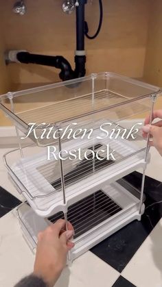 the kitchen sink resteck is open and ready to be used