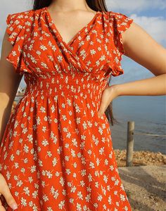 Maxi dress in orange with cream floral print. V neckline. Sleeveless dress. No fastenings. Size S, EU 34-38 / UK 6-10 Measurements: 40"/ 102cm bust - 26-30" / 66-76cm elasticated waist - 48" / 122cm hips - 50" / 127cm dress length. Condition - Excellent. Material - Viscose. Sustainability - Vintage. Handpicked, repaired and ready to wear. This is an original vintage item, not new and minor signs of wear and age are expected, we will highlight any major flaws. Model is a UK 6/8 and 5'7" tall Summer Dresses Maxi, Women Summer Dresses, Color Crema, Jumpsuit Skirt, Vestidos Vintage, Sleeveless Jacket, Floral Color, Floral Dresses, Beach Wears