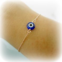 as seen on many this evil eye bracelet I've heard is supposed to bring good luck.... details: Rose Gold Filled glass evil eye measures 8mm Dainty Chain measures 1mm please select your desired length from top right drop down menu thanks for looking :0) Blue Evil Eye Bracelets, Blue Evil Eye Bracelet Gift, Blue Round Evil Eye Bracelets, Blue Evil Eye Round Bracelets, Dainty Adjustable Evil Eye Bracelet, Adjustable Blue Evil Eye Bracelet, Nickel Free, Adjustable Blue Evil Eye Bracelet Nickel Free, Blue Hypoallergenic Evil Eye Bracelet As Gift, Hypoallergenic Blue Evil Eye Bracelet Gift