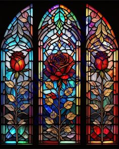 a stained glass window with roses on it