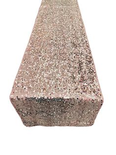 a long table covered in pink and silver sequins