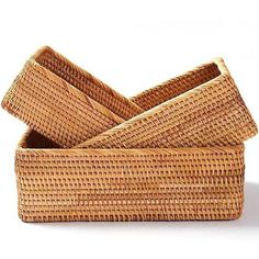 three wicker baskets stacked on top of each other in the shape of rectangles