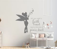 a child's bedroom with a wall decal that says, all you need is faith and a little bit of pixie dust