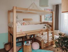 a child's bedroom with bunk beds and toys