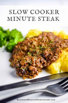 slow cooker minute steak on a plate with potatoes and broccoli next to it