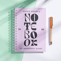 a spiral notebook with the words no to rox on it next to a pen