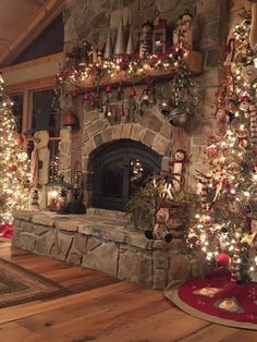 a living room decorated for christmas with lights and ornaments on the fireplace mantels