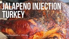 a close up of a cooked turkey on a plate with the words jalapeno injection