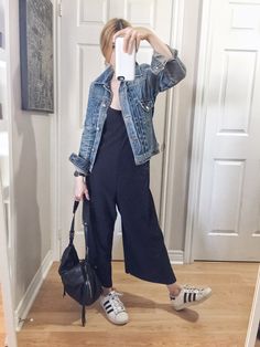 I am wearing a black jumpsuit, and vintage denim jacket, with Adidas superstars Trendy Swimwear, Mode Casual, Vintage Denim Jacket, Black Shoulder Bag, Black Side, Denim Details, Side Stripe, Denim Outfit