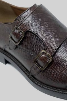 If you are after a pair of modern formal shoes then look no further. This Brown version of Walk London's Oliver Monk Strap Shoe holds nothing back with an etched leather upper combing with a double monk fastening and metal heel clip, in keeping with the overall tonality of the shoe. Boasting a cushioned sockliner, heel counter and quarter lining internally to help aid comfort, a handmade rubber outsole with horizontal line grip rounds off the piece that is primed to add extra personality to cont Walks In London, Monk Strap Shoes, Monk Strap, Formal Shoes, Leather Upper, Walking, London, Heels, Leather