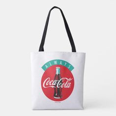 a white tote bag with an image of a coca cola bottle