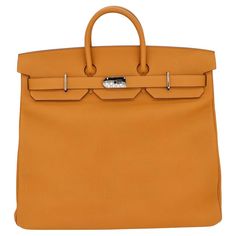 Brand: Hermès Style: HAC Size: 50cm Color: Caramel Material: Togo Leather Hardware: Palladium Hardware (PHW) Dimensions: 19.5" W x 17" H x 10.5" D Handle Drop: 4.5" Hermes Style, Togo Leather, Leather Hardware, Handle Bag, Fashion Handbags, Top Handle, Caramel, Top Handle Bag, Purses And Bags