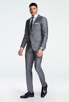 We amped up the suave factor of the Sharkskin gray suit, just for you. Blended with mohair, the Hamilton is a lustrous version of the iconic fabric. Believe us, you're going to need a bigger spotlight. Summer Wedding Suit, Grooms Suits, Custom Suits Men, Summer Wedding Suits, Gray Suits, Best Designer Suits, Sharkskin Suit, Grey Suit Men, Suits Black