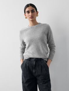 From the aptly named “Essentials” collection, this sweater is designed to be worn anytime and anyplace. It’s made from 100% traceable cashmere with finely ribbed trims and a straight fit for comfort. Keep this staple at the top of your knit drawer—it’s the kind of style you’ll be reaching for often. Details Straight fit. Long sleeve. Length in size small is 23" The model is 5'9" and is wearing a size small. 100% Cashmere Hand wash cold or dry clean. Do not twist or wring. Reshape and lay flat to Cashmere Tops With Ribbed Neckline For Work, Relaxed Fit Cashmere Sweater With Ribbed Detail, Ribbed Cashmere Sweater In Relaxed Fit, Relaxed Fit Ribbed Cashmere Sweater, Cashmere Ribbed Sweater With Relaxed Fit, Classic Ribbed Sweater For Everyday, Classic Ribbed Everyday Sweater, Relaxed Fit Cashmere Sweater With Ribbed Neckline, Classic Ribbed Cashmere Sweater