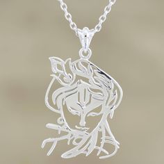 Indian artisan Anant designs this pretty pendant necklace featuring Lord Krishna, the Hindu god of compassion, tenderness, love. Crafted from sterling silver, the pendant is created with an openwork design and swings on a sleek, shining cable chain. Artistic Engraved Sterling Silver Necklaces, Artistic Engraved Sterling Silver Necklace, Sterling Silver Spiritual Charm Necklace With Large Pendant, Artistic Sterling Silver Necklaces, Nickel Free, Artistic Silver Necklace For Wedding, Artistic Sterling Silver Necklace Nickel Free, Silver Filigree Symbolic Jewelry, White Sterling Silver Spiritual Charm Necklaces, Artistic Sterling Silver Nickel-free Necklace